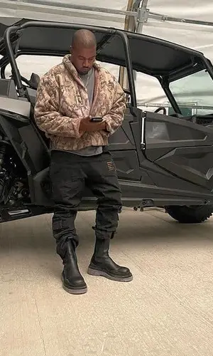 Kanye West wearing Yeezy t-shirt