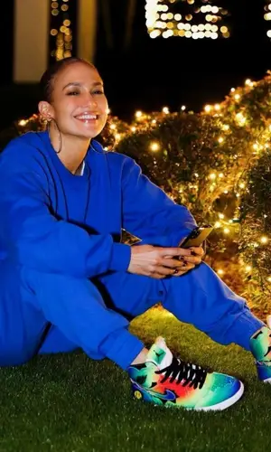 Jennifer Lopez wearing J Balvin Merch sneakers