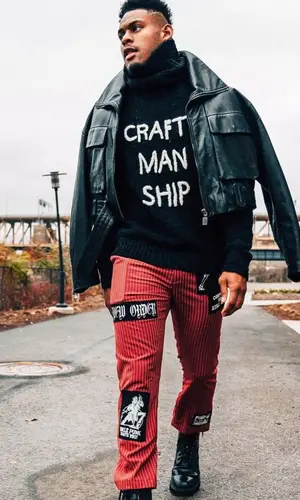 JuJu wearing Dolce & Gabbana jacket