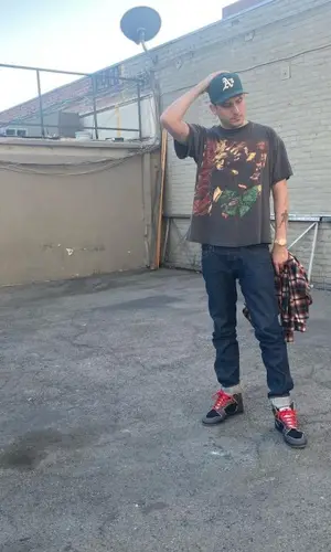 G-Eazy wearing Nike sneakers