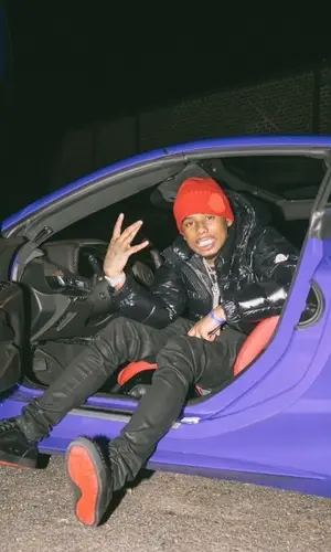 Pooh Shiesty wearing Moncler jacket