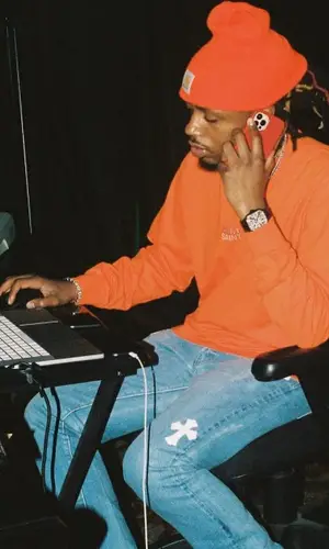 Metro Boomin wearing Saint Alfred top