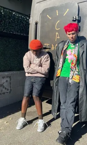 Don Toliver wearing McDonald's Merch shorts