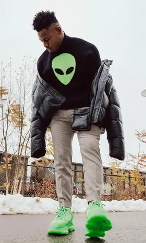 JuJu wearing Balenciaga sweater
