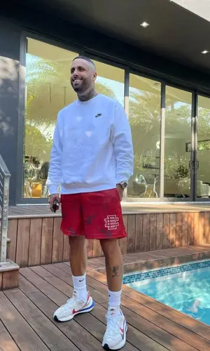 Nicky Jam wearing Bape shirt