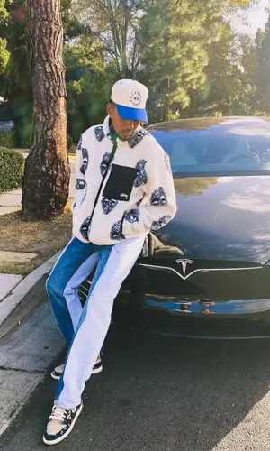 Nick Young wearing Stussy jacket
