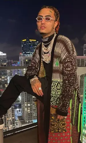 Lil Pump wearing Cough Syrup top