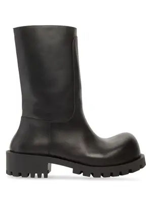 Boots in Shai’s closet