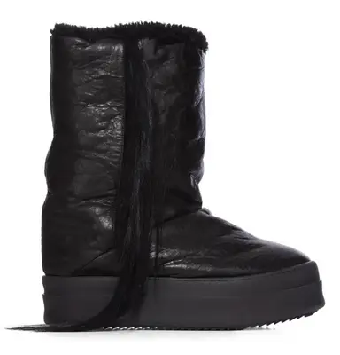 Boots in Destroy Lonely’s closet