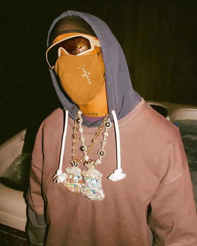 Travis Scott outfit in Prada, Takashi Murakami, and Cactus Jack, 2021