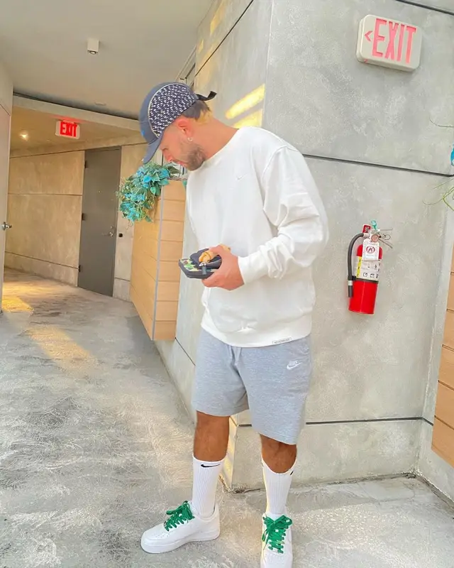 Feid outfit in Supreme and Nike, 2021