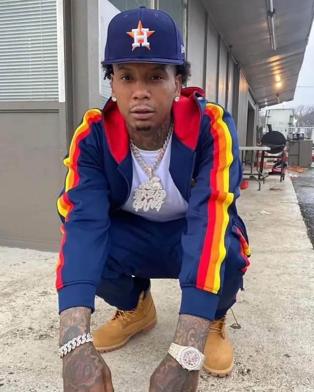 Moneybagg Yo outfit in Bread Gang, Timberland, and New Era, 2021