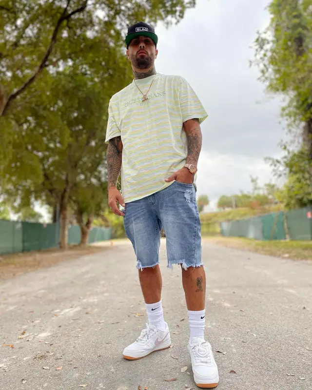 Nicky Jam outfit in Travis Scott Merch and Nike, 2021