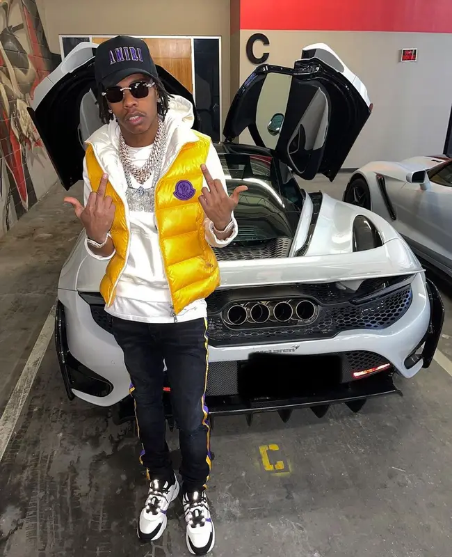 Lil Baby outfit in Moncler, Dior, and Amiri, 2021