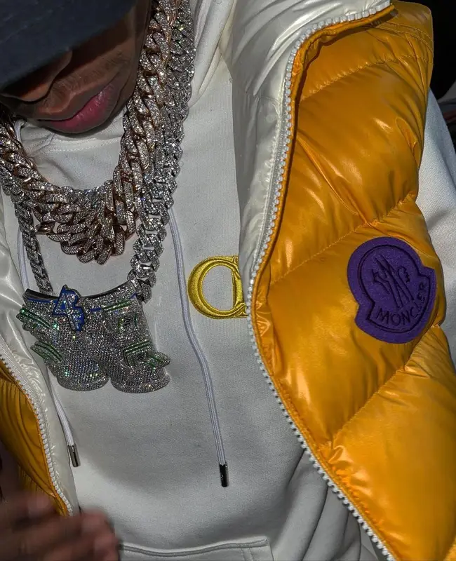 Lil Baby outfit in Moncler, Dior, and Amiri, 2021