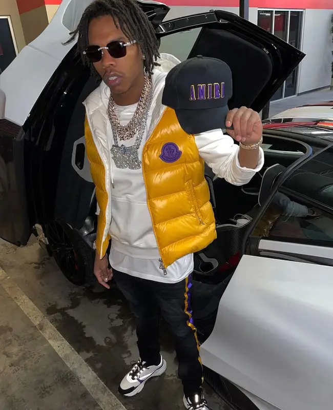 Lil Baby outfit in Moncler, Dior, and Amiri, 2021