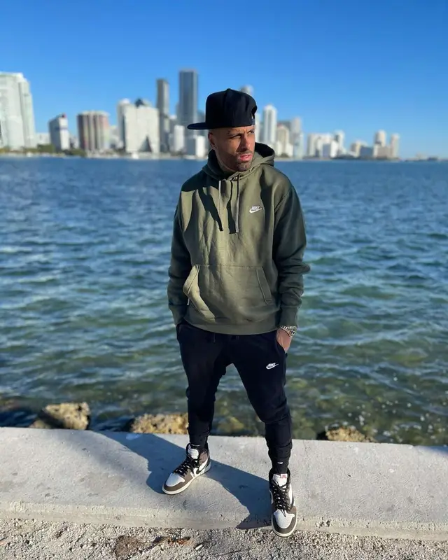 Nicky Jam outfit in Nike and Travis Scott Merch, 2021