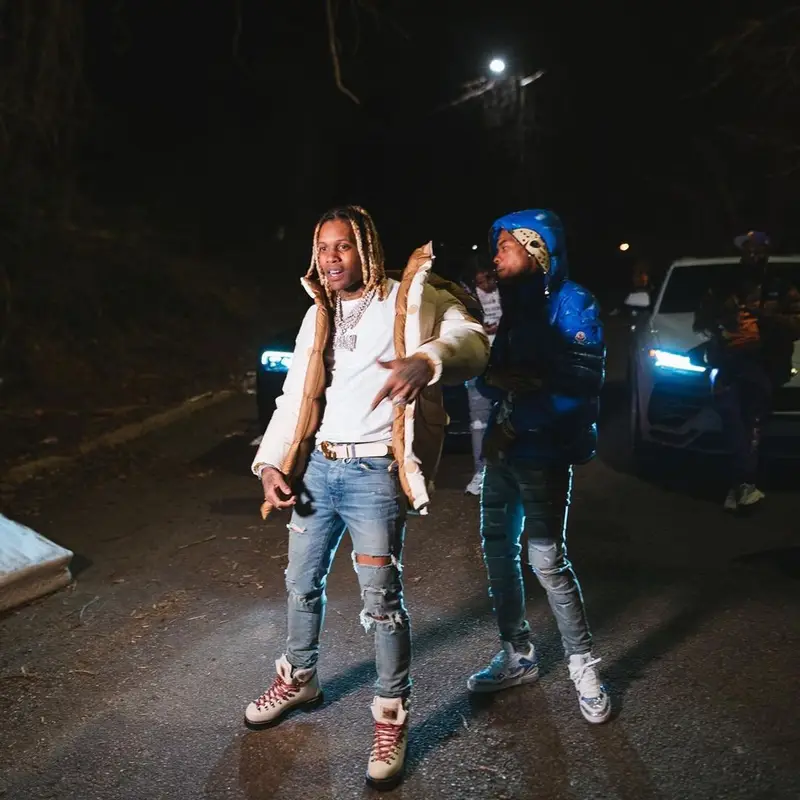 Lil Durk outfit in Gucci, Amiri, and The North Face, 2021