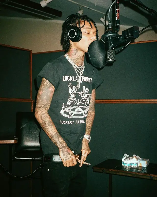 Swae Lee outfit in Rta, Louis Vuitton, and Audio Technica, 2021