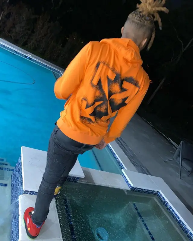 YNW Bortlen outfit in Off-White, Balmain, and Gucci, 2021