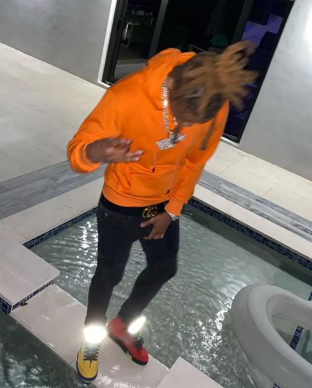 YNW Bortlen outfit in Off-White, Balmain, and Gucci, 2021