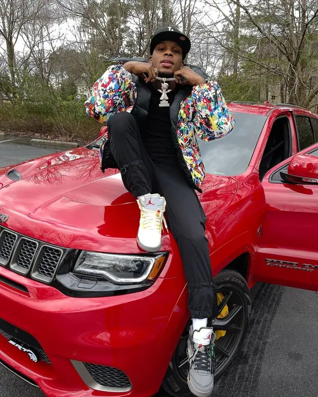 Toosii outfit in Kash Kouture and New Era, 2021