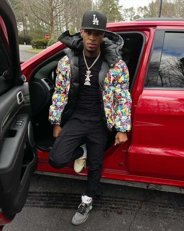 Toosii outfit in Kash Kouture and New Era, 2021