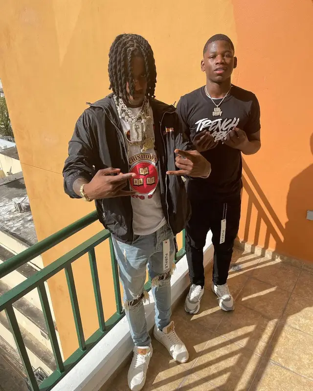 Polo G outfit in Palm Angels, Market, and Purple Brand, 2021