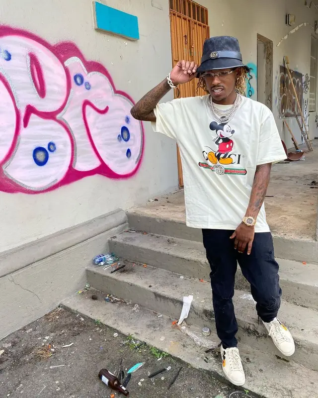 Rich The Kid outfit in Disney and Gucci, 2021