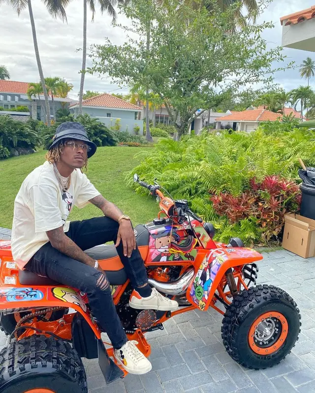 Rich The Kid outfit in Disney and Gucci, 2021