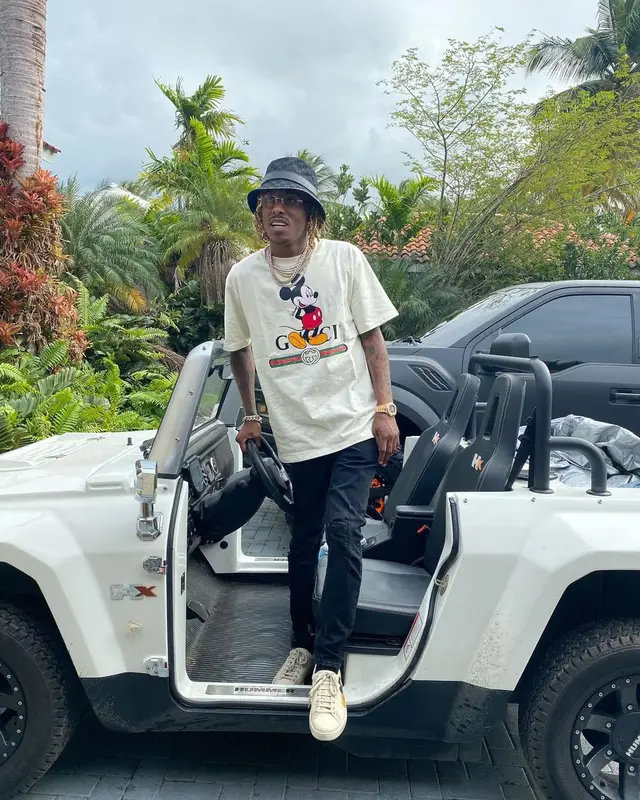 Rich The Kid outfit in Disney and Gucci, 2021