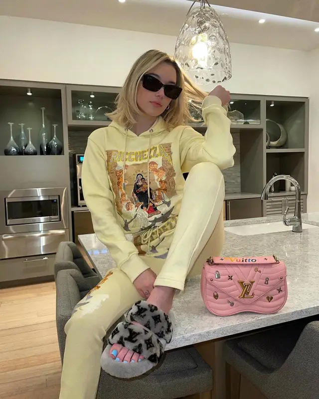Sarah Snyder outfit in Ricchezza Forever and Louis Vuitton, 2021