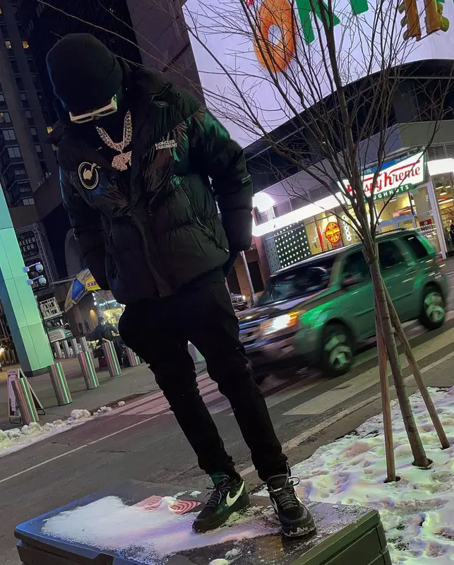 Lil Baby outfit in Moncler, Off-White, and Amiri, 2021