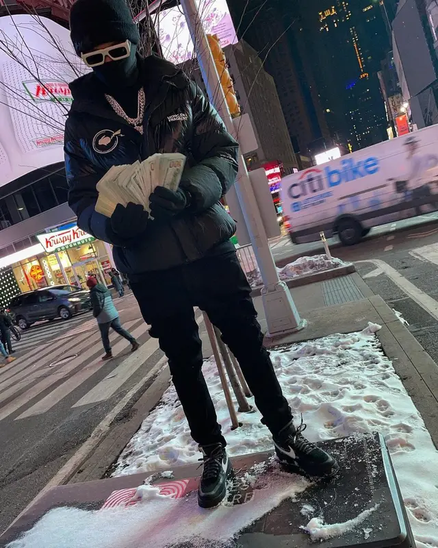 Lil Baby outfit in Moncler, Off-White, and Amiri, 2021