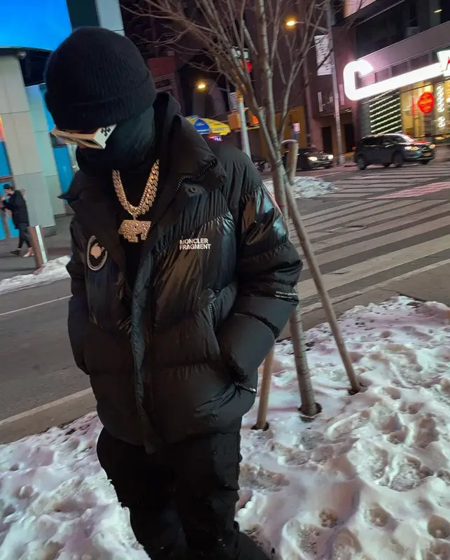 Lil Baby outfit in Moncler, Off-White, and Amiri, 2021