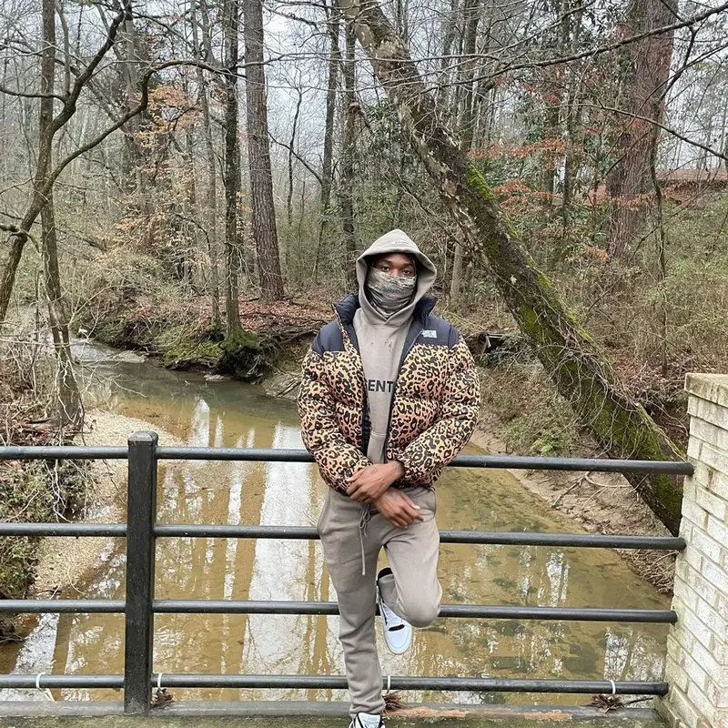 Meek Mill outfit in Vetements, Fear of God, and Puma, 2021