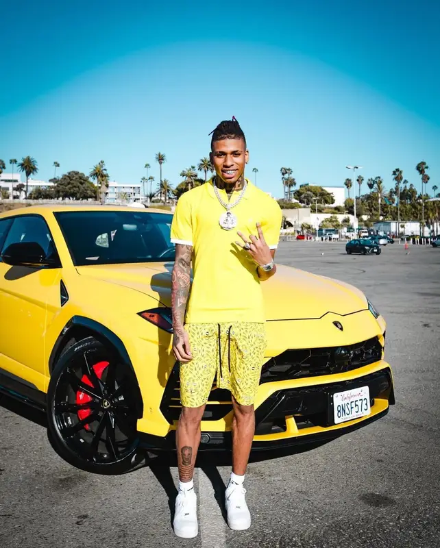 NLE Choppa outfit in Vilebrequin and Nike, 2021
