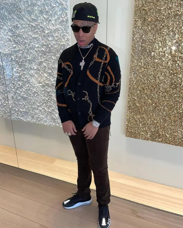 Lil Gotit outfit in Amiri, Cough Syrup, and Ray-Ban, 2021
