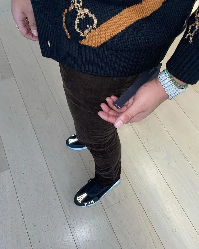 Lil Gotit outfit in Amiri, Cough Syrup, and Ray-Ban, 2021