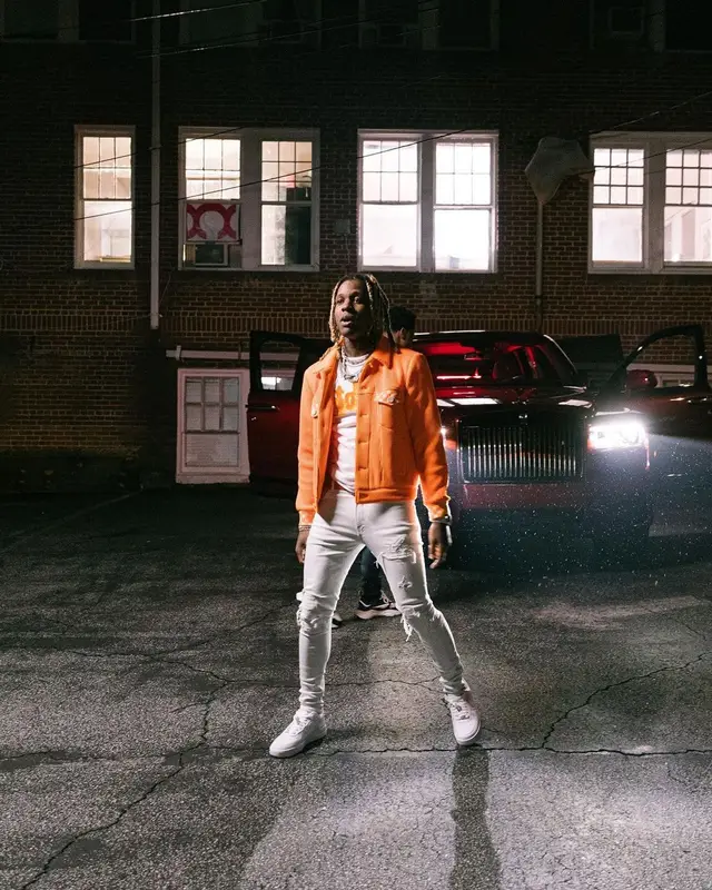 Lil Durk outfit in Louis Vuitton, Amiri, and Nike, 2021