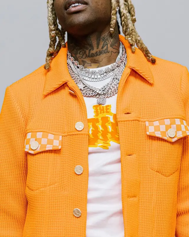 Lil Durk outfit in Louis Vuitton, Amiri, and Nike, 2021