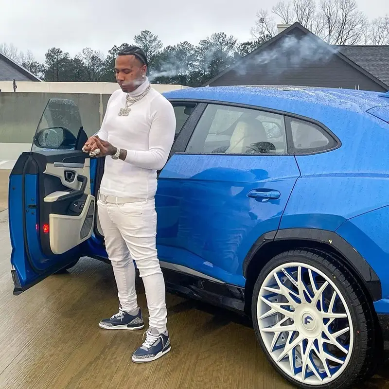Moneybagg Yo outfit in Louis Vuitton, Valabasas, and Jordan, 2021