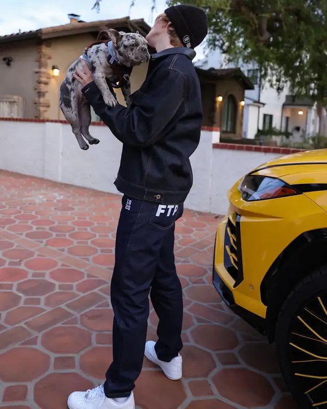 The Kid Laroi outfit in Palm Angels, Fuck The Population, and Vans, 2021