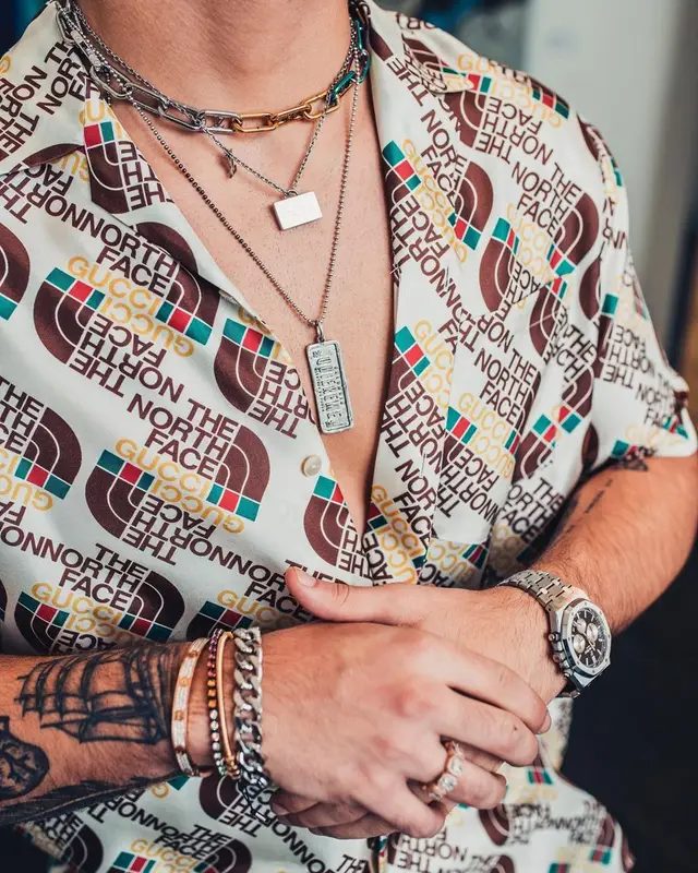Manuel Turizo outfit in Gucci, Louis Vuitton, and NBA, 2021