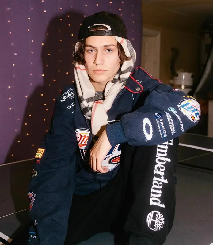 Lil Huddy outfit in Nascar, Timberland, and Burberry, 2020