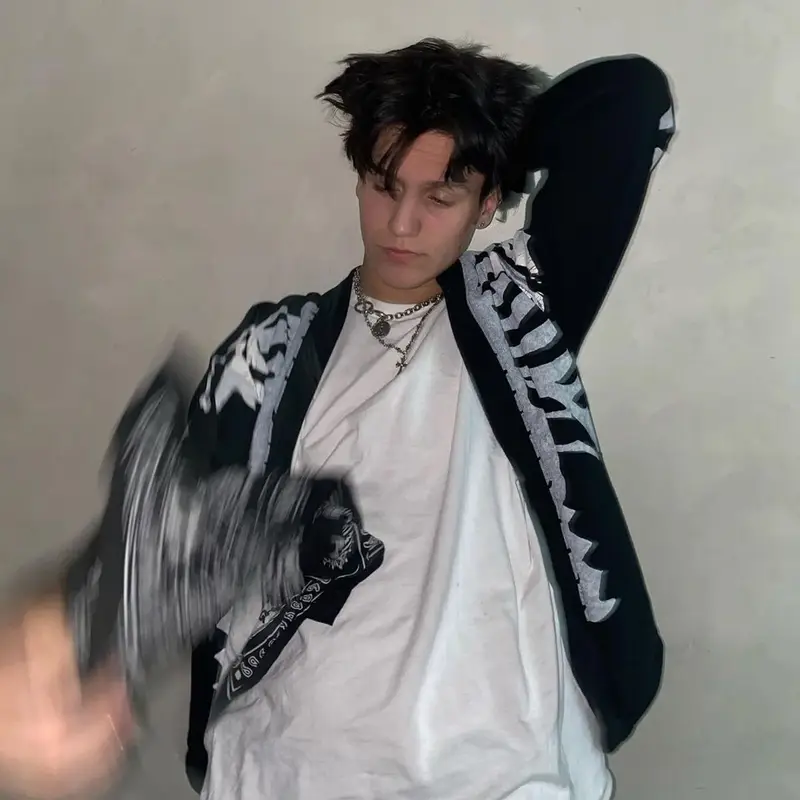 Lil Huddy outfit in Kapital, Amiri, and Machine Gun Kelly Merch, 2020