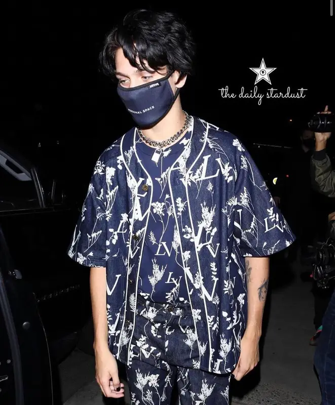 Lil Huddy outfit in Louis Vuitton, Nike, and Just Hype, 2020