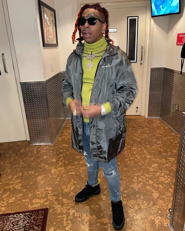 Lil Gotit outfit in M+RC Noir, Jordan, and Ray-Ban, 2021