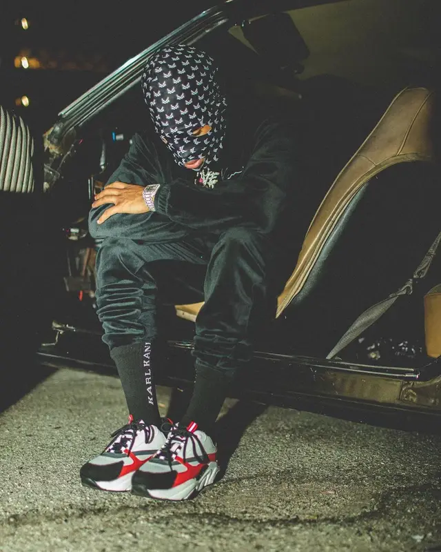 NLE Choppa outfit in Karl Kani and Dior, 2021