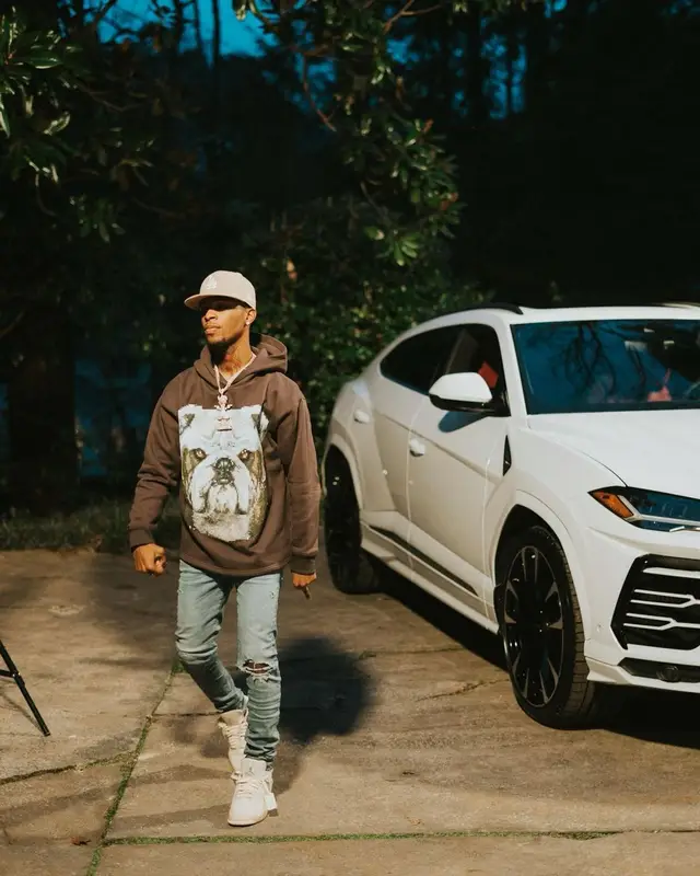 Toosii outfit in Homme + Femme, New Era, and Baden Sports, 2021